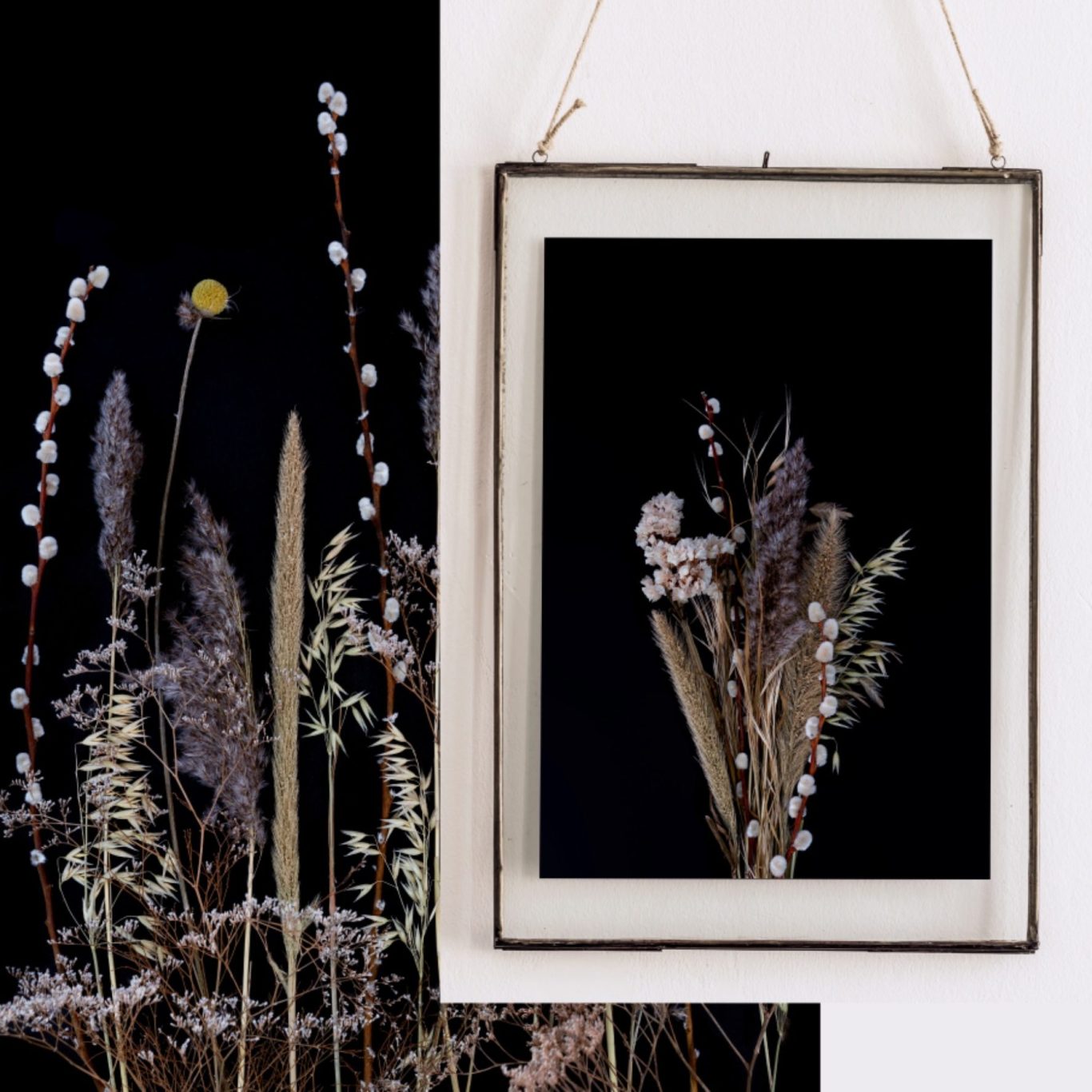 Art & Eden floral preservation: framed artwork of dried blooms and grasses, including pussy willow, on a black background. Elegant keepsake.